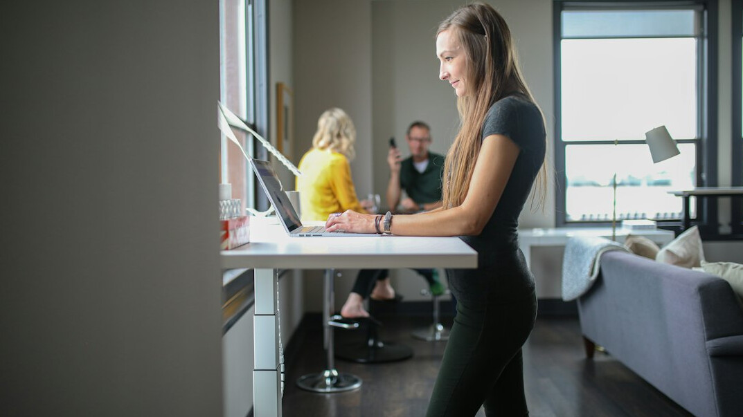 team doing office exercises