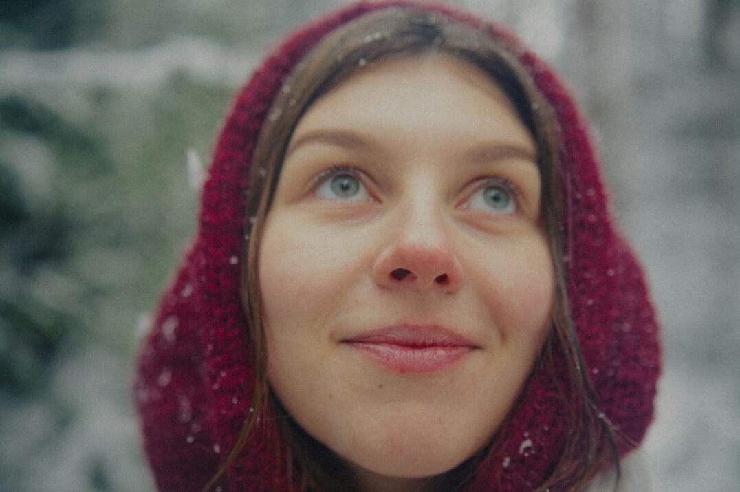 Portrait of a young woman with a warm smile